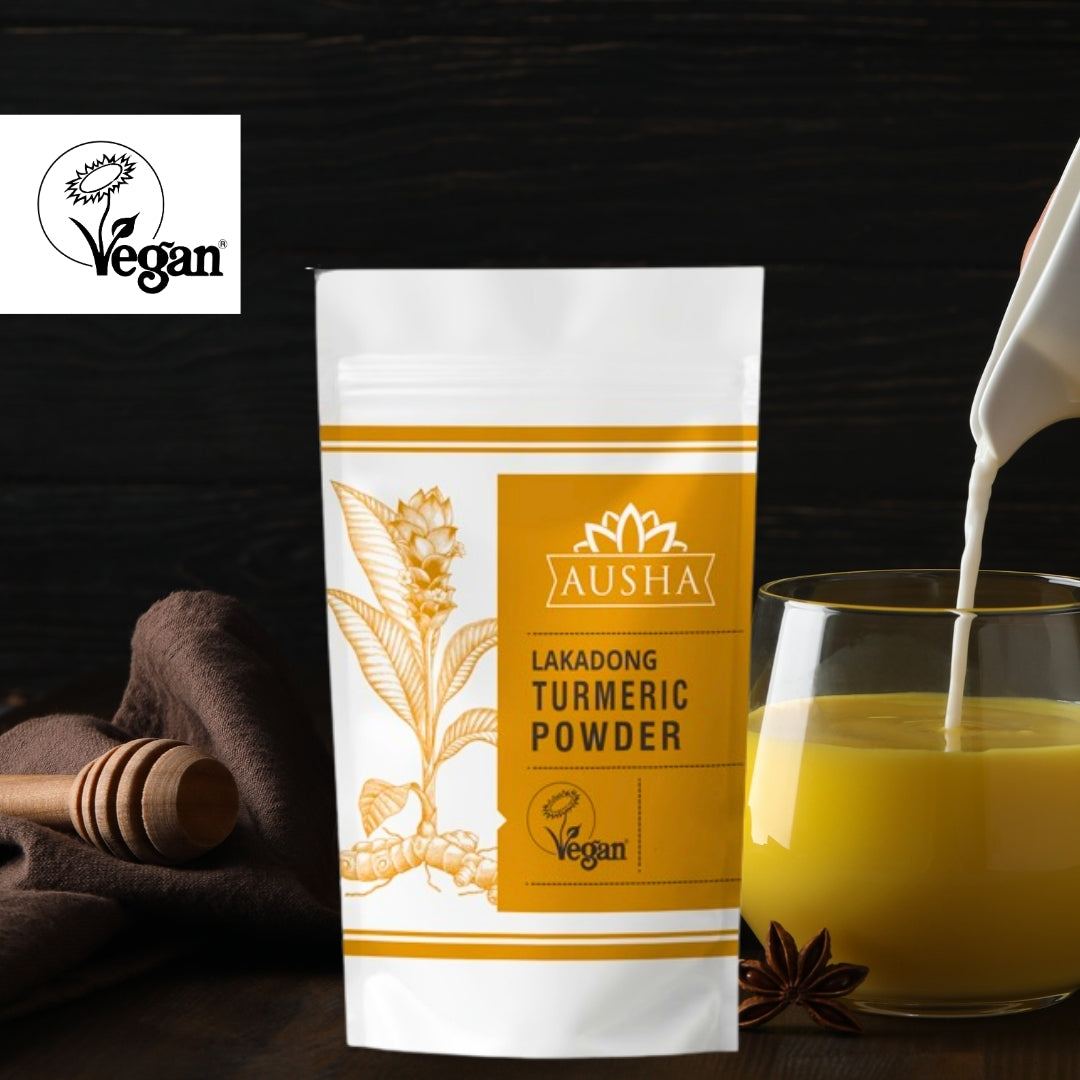 Lakadong Turmeric Powder in vegan packaging with a glass of golden milk being poured, highlighting high curcumin content and GI certification.