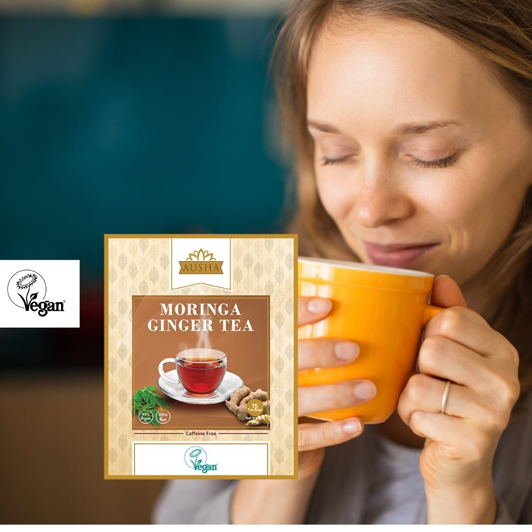 Moringa Ginger Tea packaging with a woman enjoying a cup of tea.
