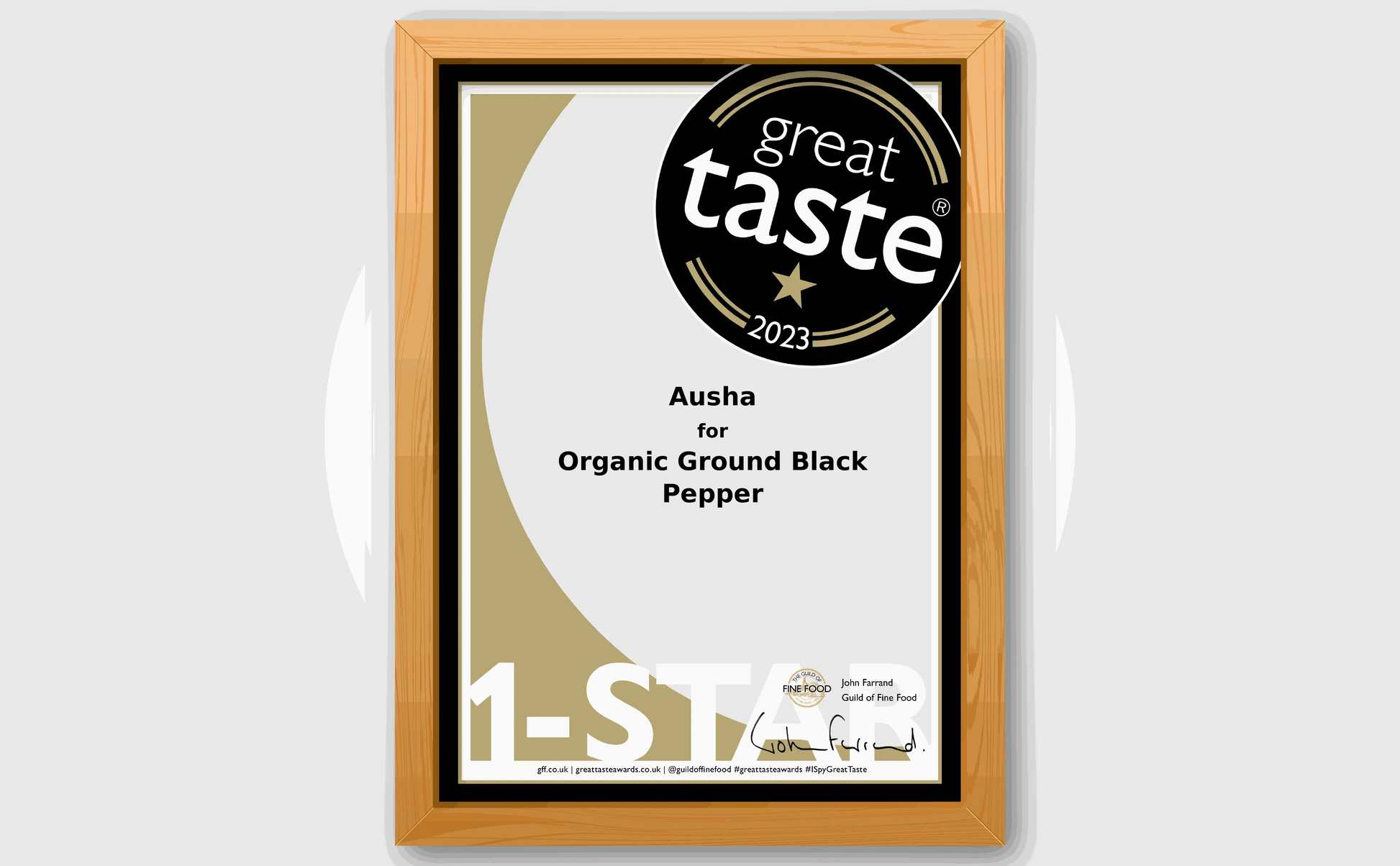 Award certificate for Organic Black Pepper, Great Taste Award 2023, 1-star rating, wooden frame.