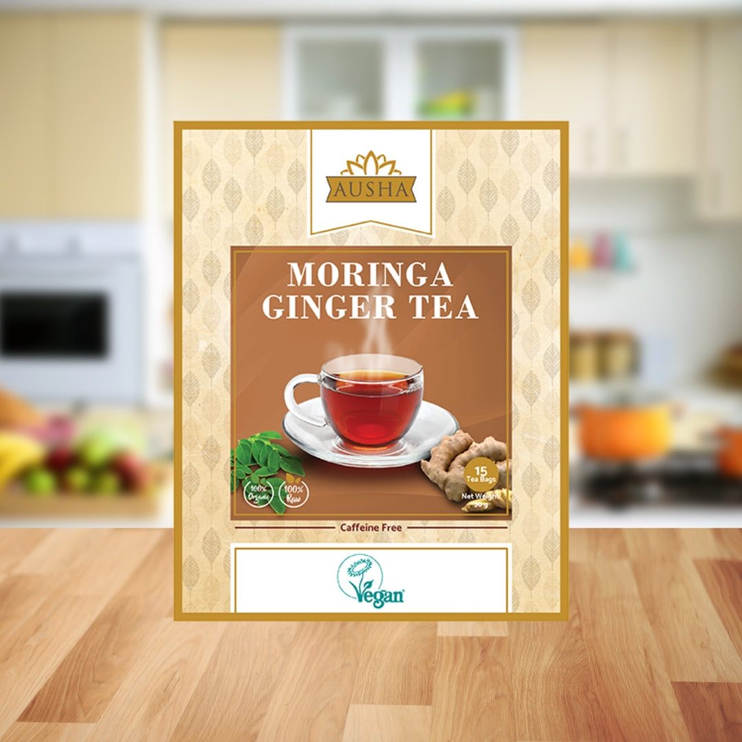 Moringa Ginger Tea box with 20/40 tea bags on kitchen counter.