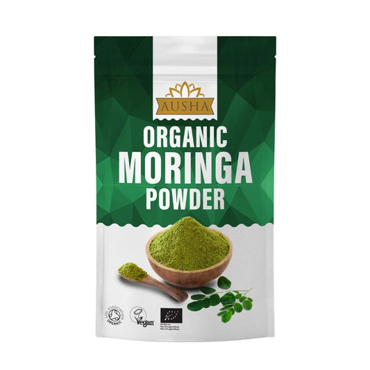 Organic Moringa Powder in a green package with a bowl and spoon, certified by Soil Association and Vegan Society.