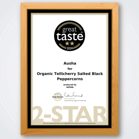 Award certificate for Ausha Organic Tellicherry Salted Black Peppercorns, Great Taste 2024, 2-star rating.